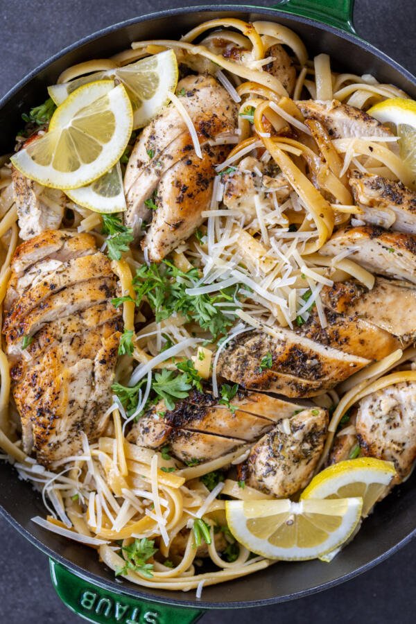 Lemon Chicken Pasta in a pan with Parmesan and herbs.