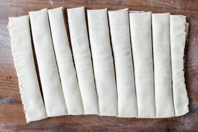 Puff pastry sliced into long pieces.