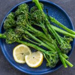 Roasted Broccolini on a serving tray.