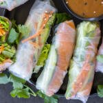 Spring Rolls With Salmon on a serving tray.