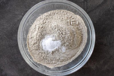 Buckwheat flour with baking powder in a bowl.