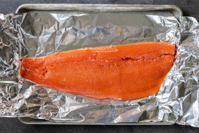Salmon fillet on a piece of foil.