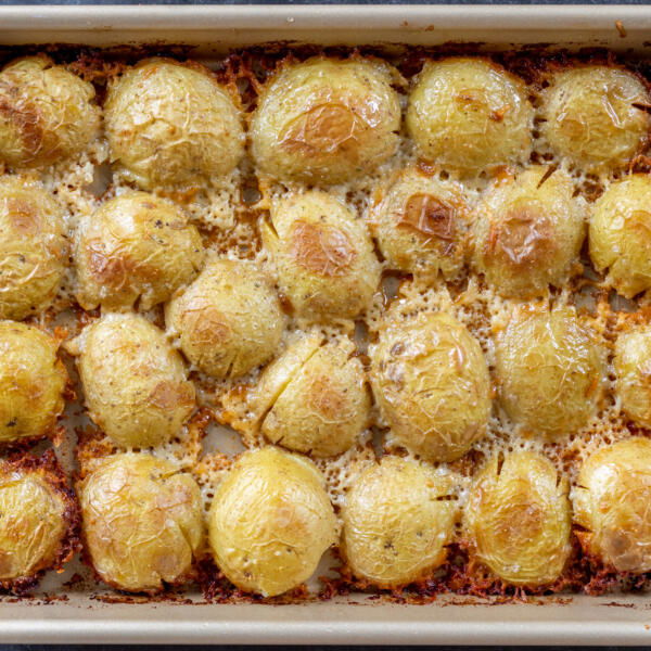 Baked potatoes on a baking sheet.