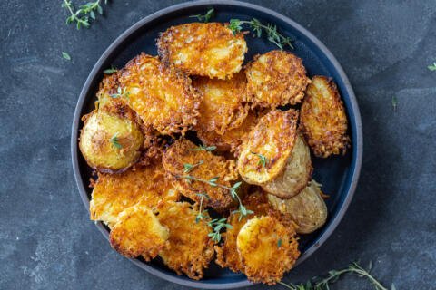Parmesan Crusted Potatoes on a serving plate.