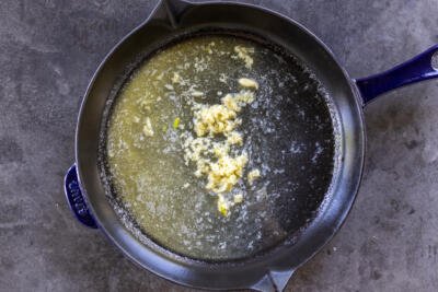 Butter and garlic in a pan.