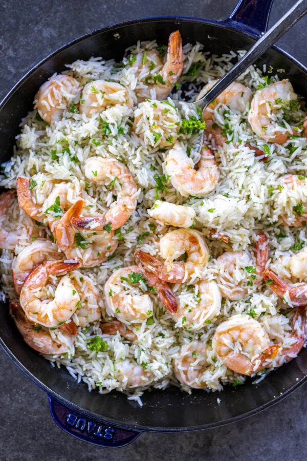 Shrimp & Rice in a pan wth herbs. 