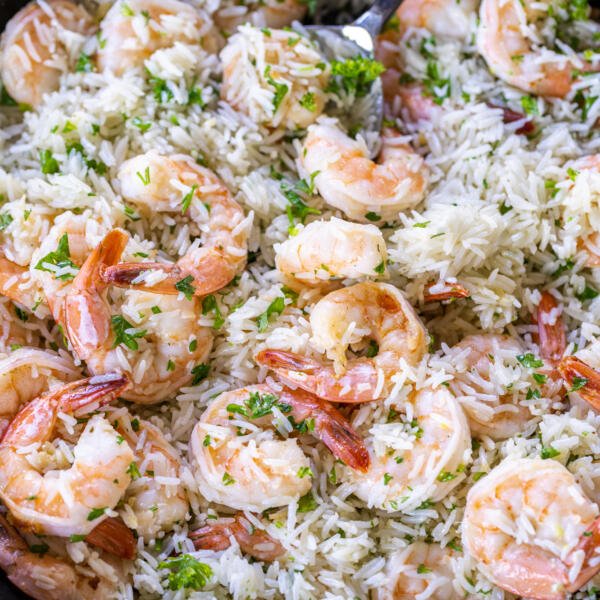 Shrimp and recipe in a serving tray with a spoon. 