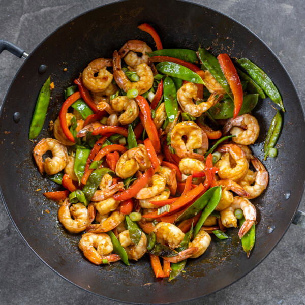 Shrimp stir fry in a wok.
