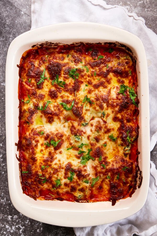 Baked Spinach Stuffed Shells in a baking pan.