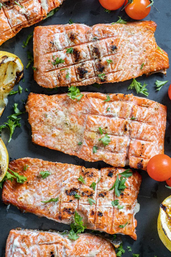 Grilled salmon on a serving tray. 
