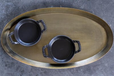 Tray with small bowls on top.