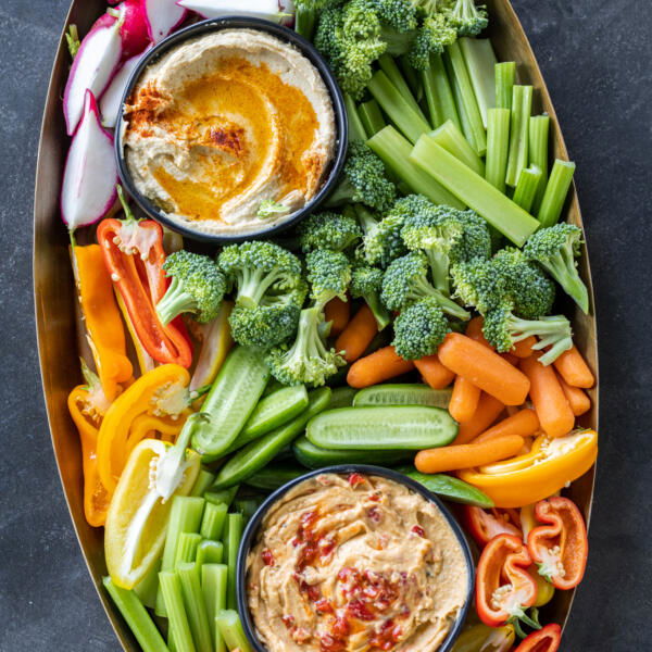 Crudite Platter on a serving tray with hummus.