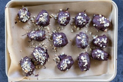 Dates coated in chocolate and nuts