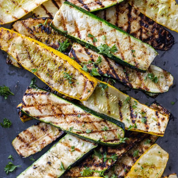 Grilled Zucchini and Squash on a serving tray.