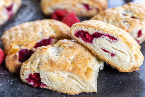 Baked Raspberry Scones on a tray.