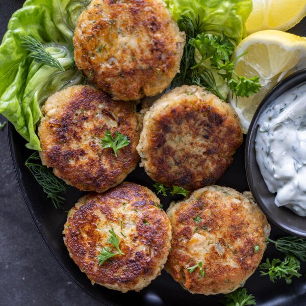 Salmon cakes on a plate.