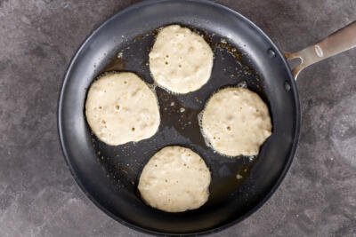 Pancakes on a frying pan.