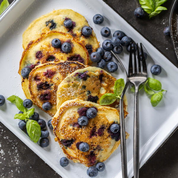 Blueberry pancakes on a plate.