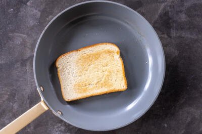 Toasting bread on a pan.