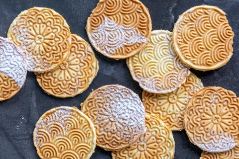 Pizzelle with powdered sugar.