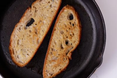Toasted bread on a skillet.