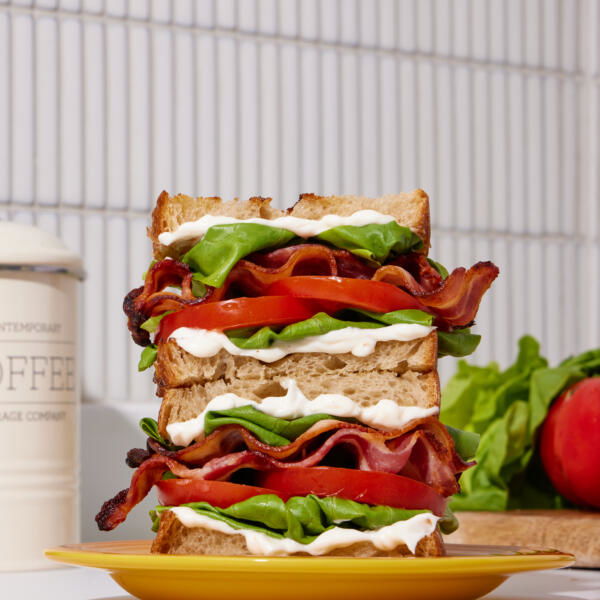 BLT sandwich on a plate.