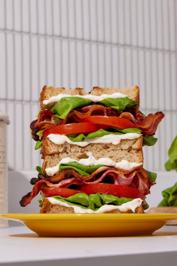 BLT sandwich on a plate. 
