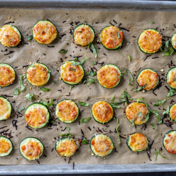 Baked Zucchini Pizza Bites on a baking sheet.