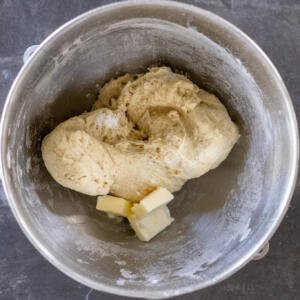 Dough with butter added to the mixing bowl.