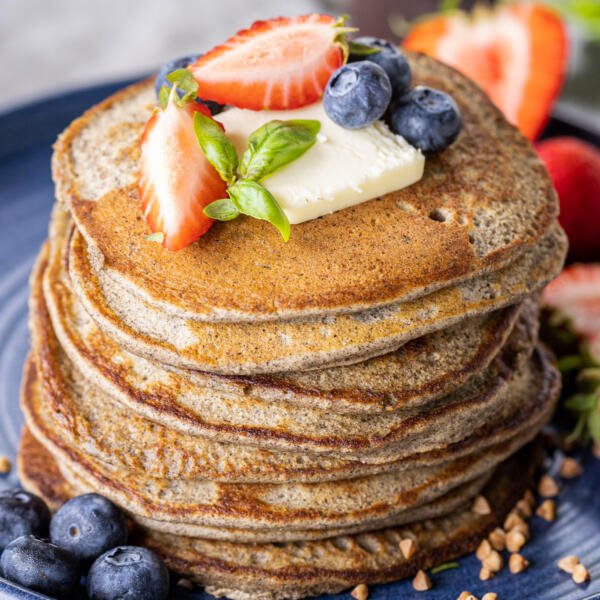 Plate with Buckwheat Pancakes and berries.