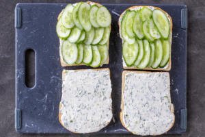 Cucumber slices on a bread piece.