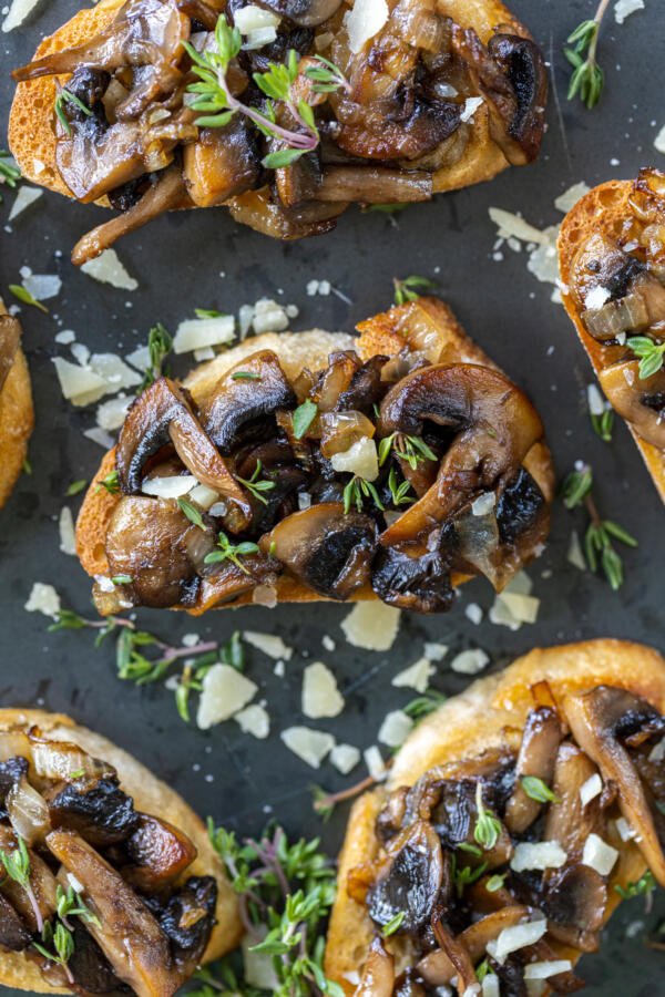 Mushroom Bruschetta with parmesan and herbs. 