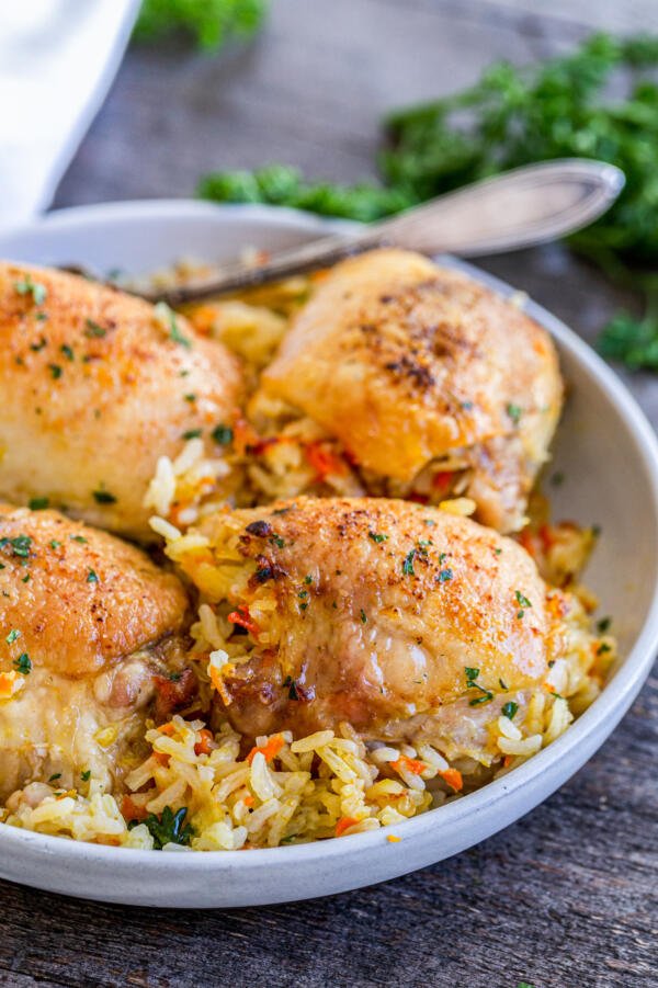 Stuffed chicken with rice in a plate.
