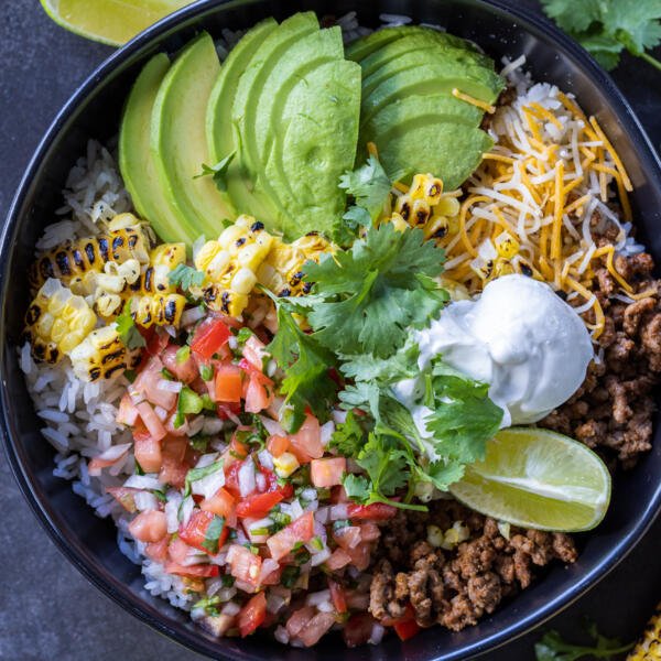 Burrito Bowl with lime, avocado and herbs.