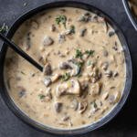 Cream of mushroom soup in a bowl.