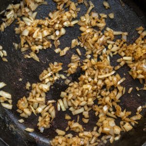 Cooked onions in a pan.