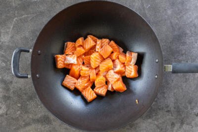 Salmon in a wok.