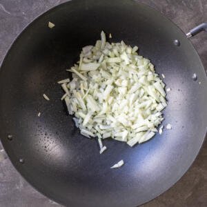 Onions in a wok.