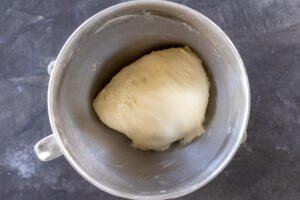 Beignets dough in a mixing bowl.