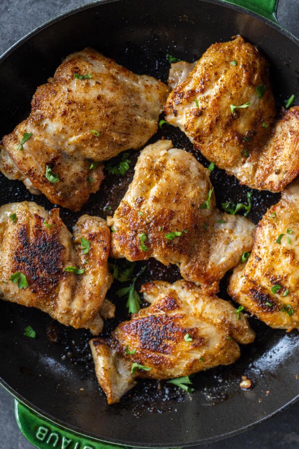 Frying pan with Blackened Chicken.