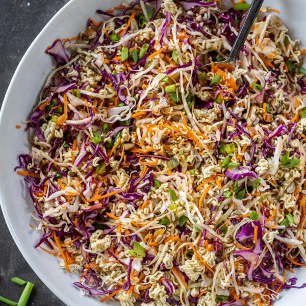 Ramen Noodle Salad in a bowl with a spoon.