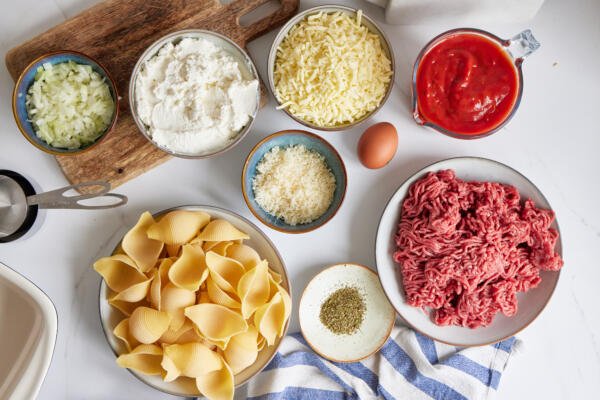 Ingredients for stuffed shells with meat.