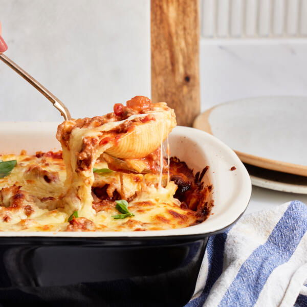 Spooned Stuffed Shells with Meat Sauce.