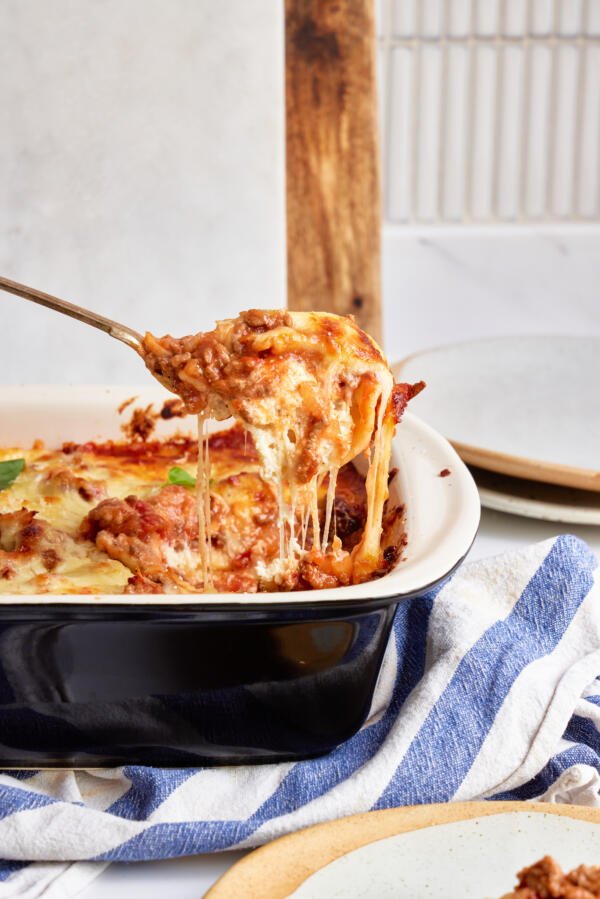 Spoon with Stuffed Shells with Meat Sauce.
