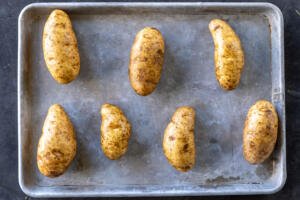 Potatoes on a baking dish.
