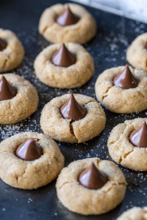 Peanut Butter Blossoms with sprinkles of sugar.