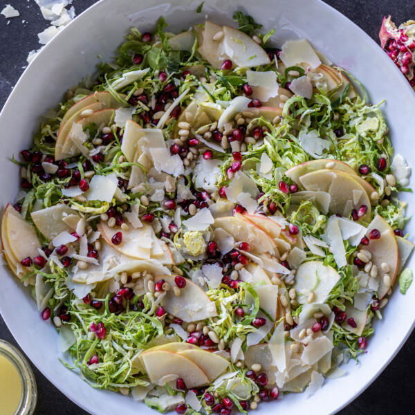 A bowl with Shaved Brussels Sprout Salad.