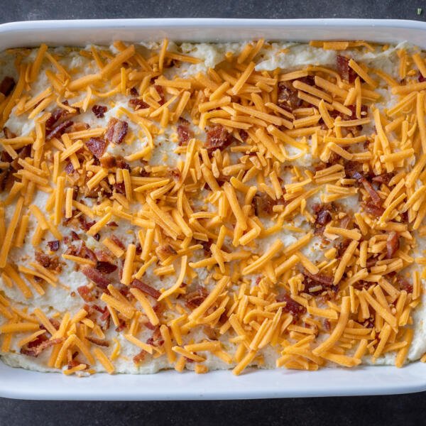 Mashed potatoes with cheese and bacon.