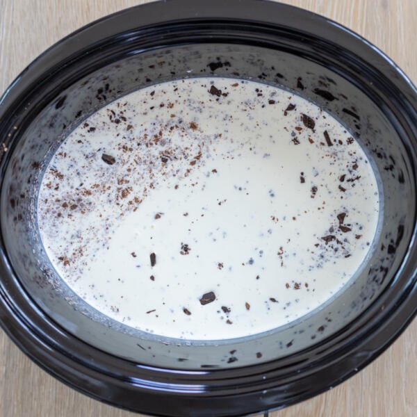 Milk and chocolate in a crock pot.