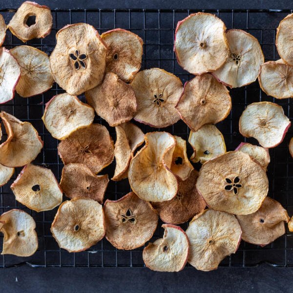 Apple chips on a cooling rack.